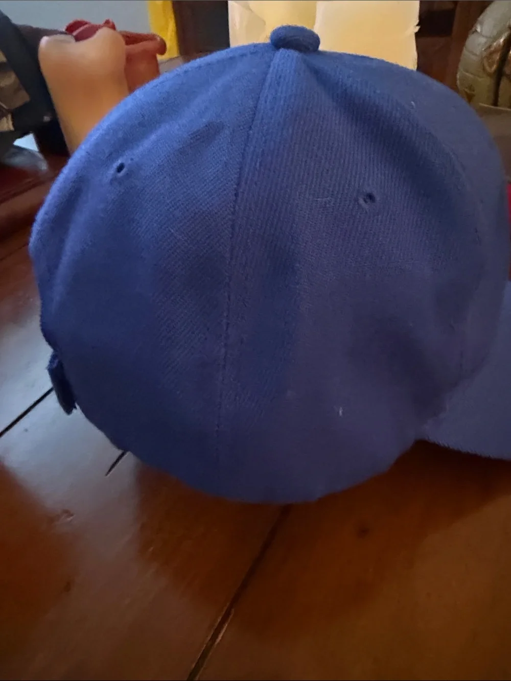 Blue Cap with White Embroidered Script 'E'
